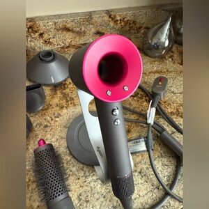 Dyson blow dryer with air wrap attachments